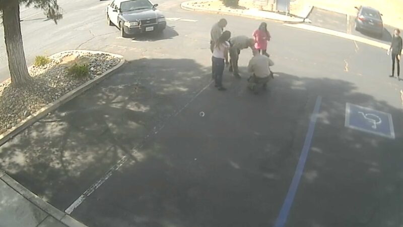Palmdale Deputies rescuing a baby.