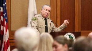 Sheriff speaking passionatly at a Town Hall