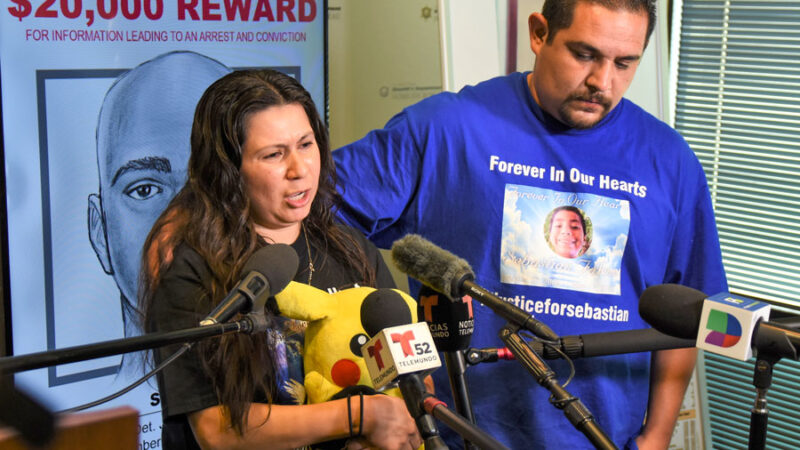 Emotional Falcon family speaking to press