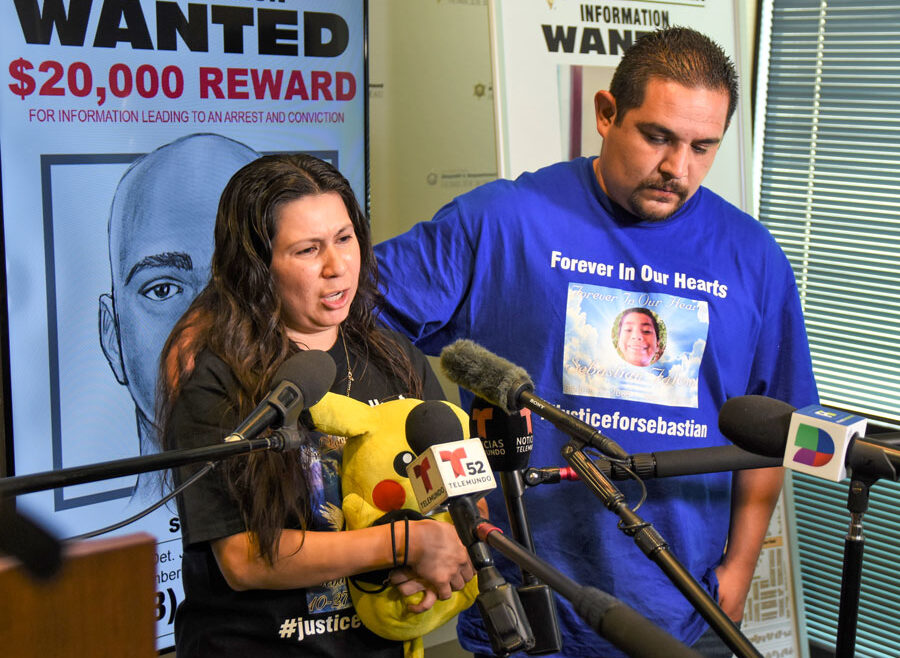 Emotional Falcon family speaking to press
