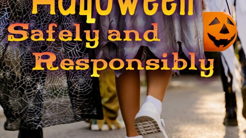 text in an orange yellow gradient that reads, "Celebrate Halloween safely and responsibly. image of three people walking down a street. the three people are pictured from the waist down, wearing a witch costume with black shoes, a ghost with white shoes.
